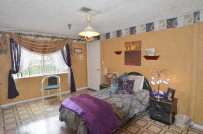 Cozy bedroom with warm colors and personal touches