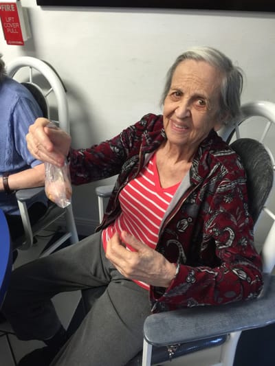 Resident engaging in an activity with a smile