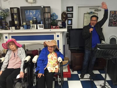 Residents enjoying a social event in a common area