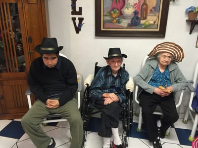Residents sitting together in a cozy common area