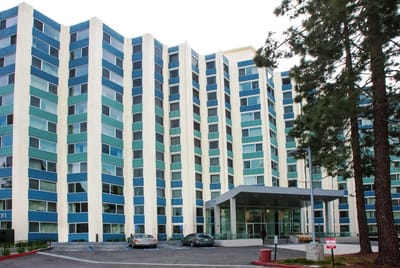 Exterior view of a modern assisted living facility.