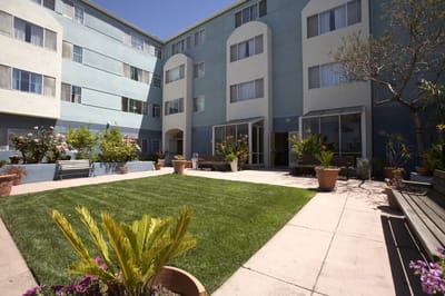 Well-maintained garden area with greenery and seating.