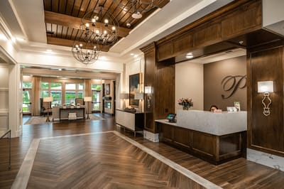 Welcoming lobby area with reception desk and seating.