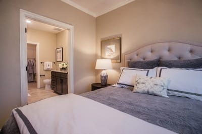 Cozy bedroom with bathroom entrance