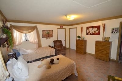 Cozy room with two beds and decorative elements