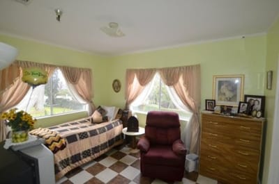 Cozy resident room with natural light and personal touches