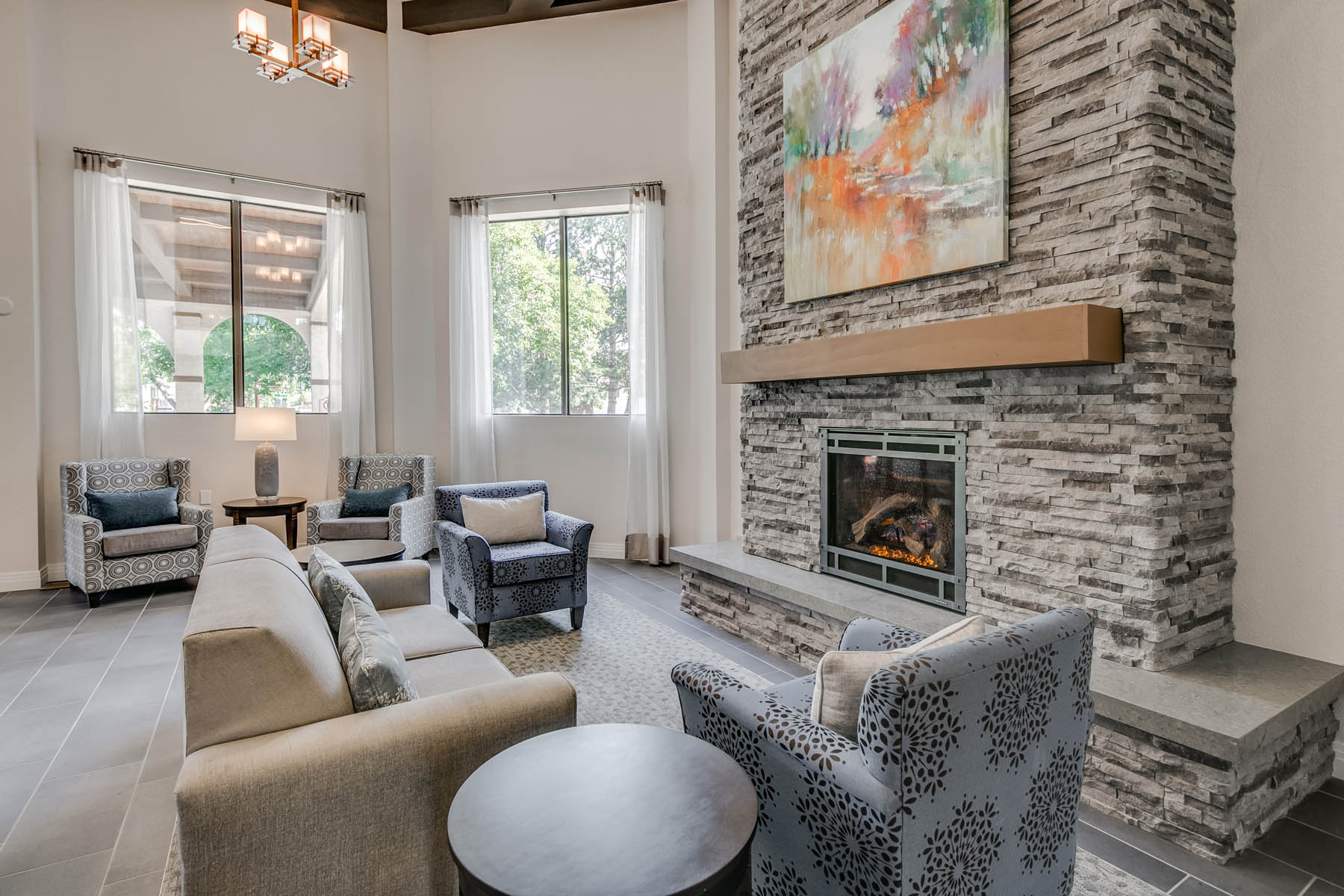 Common area with seating and a fireplace