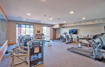 Interior view of a fitness room with exercise equipment