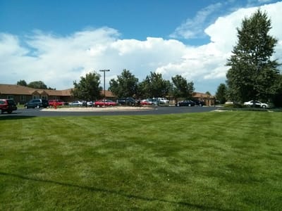 Outdoor view of parking area and landscaping