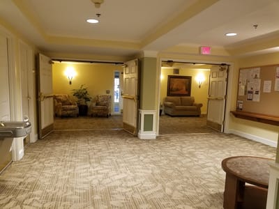 Bright interior common area with seating and decor