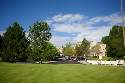 Exterior view of assisted living facility with landscaping