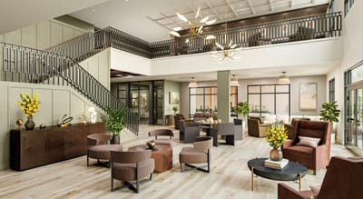 A bright, spacious common area with comfortable seating