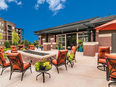 Outdoor patio area with seating and planters