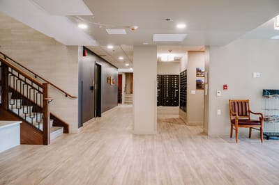 A view of the interior lobby area with a staircase