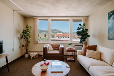Bright, welcoming living room with mountain view