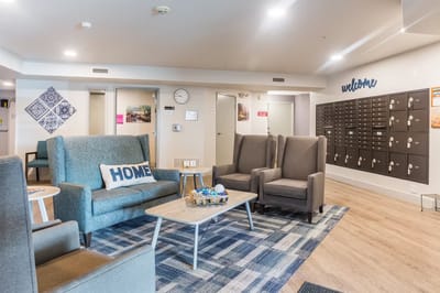 Bright common area with comfortable seating and decor
