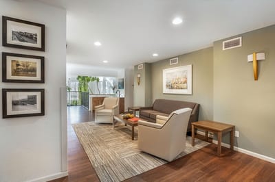 Bright common area with seating and decor