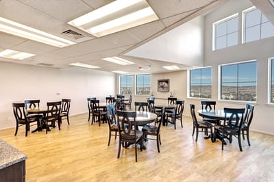 Bright dining room with tables and chairs