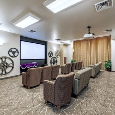 Interior view of a cozy common area with seating
