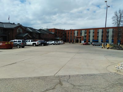 Exterior view of the facility with parking area