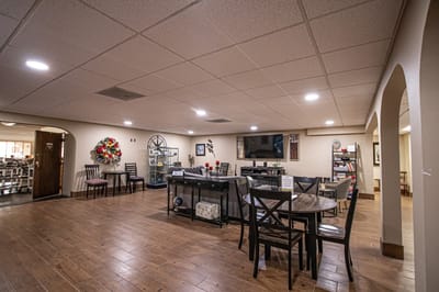 Common area with seating and displays in the facility.