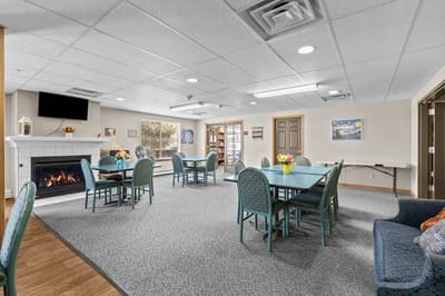 Bright common area with tables and chairs