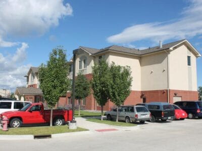 Exterior view of the facility with parking