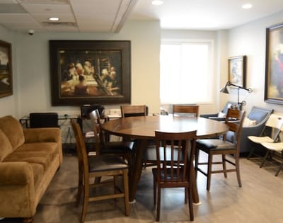 Cozy common area with seating and artwork
