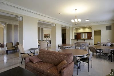Bright common area with tables and chairs