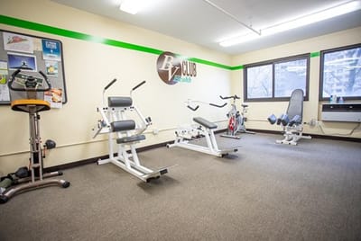 Interior view of a fitness area with exercise equipment
