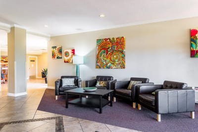 Colorful lobby with comfortable seating and art