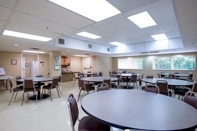 Interior common area with tables and chairs