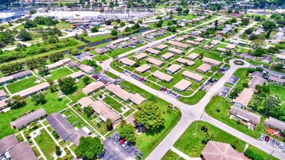 Aerial view of residential buildings and green spaces