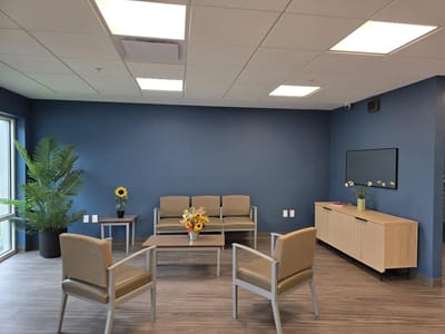 Modern common area with seating and plants