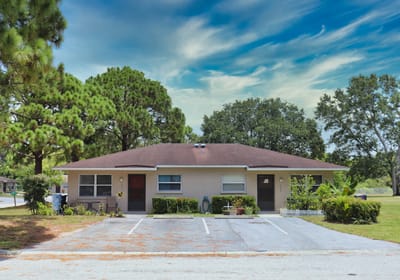 Exterior view of a residential building with trees