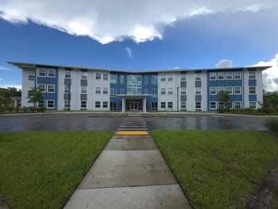 Exterior view of Presbyterian Towers facility building.
