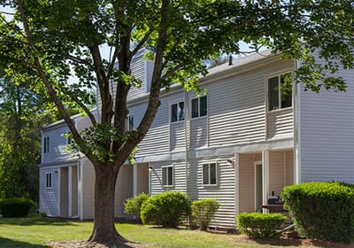 Exterior view of a residential building in a landscaped area.