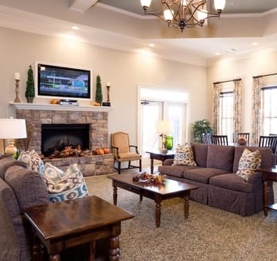 Cozy common area with seating and a fireplace