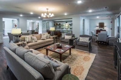Bright, comfortable common area with seating and decor.