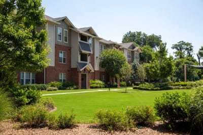 Exterior view of a landscaped assisted living facility