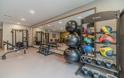 Interior view of a fitness area with workout equipment