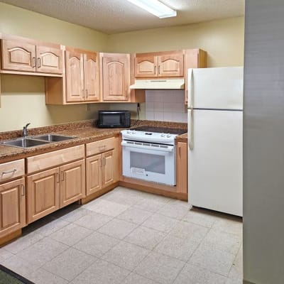 Bright kitchen area with appliances.