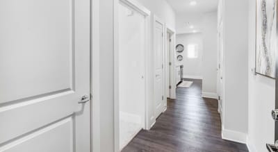 Hallway with white walls and modern decor