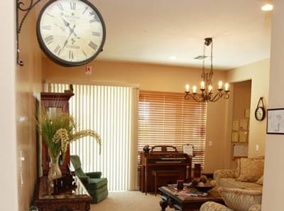 Cozy common area with seating and a clock