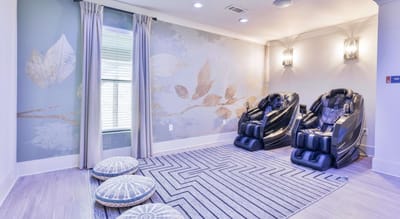 Relaxation area with massage chairs and decor