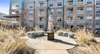 Outdoor sitting area with artistic benches.