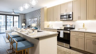 Modern kitchen space with dining area.