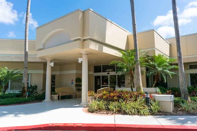 Entrance of Sandhill Cove Retirement Living with landscaping