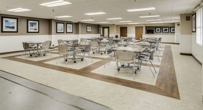 Dining area with empty tables and chairs