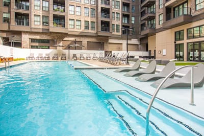 Swimming pool area with lounge chairs